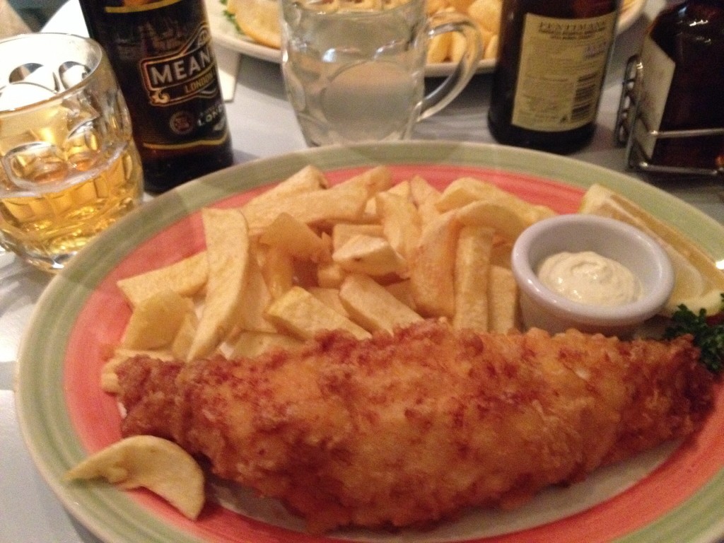 Fried fish, chips and beer at Poppies  